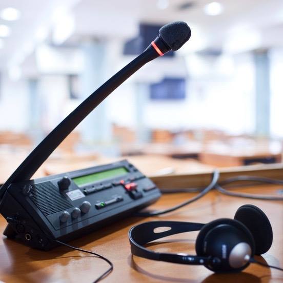 Microphone and headset used for interpreting equipment solutions.