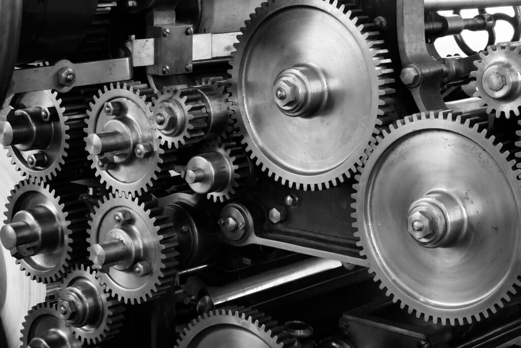 Wheels and gears, illustrating expert translation services in the technical field.