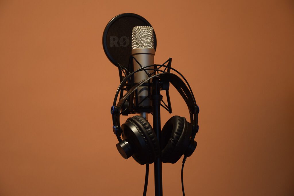 Microphone and headphones illustrating voice-over services.